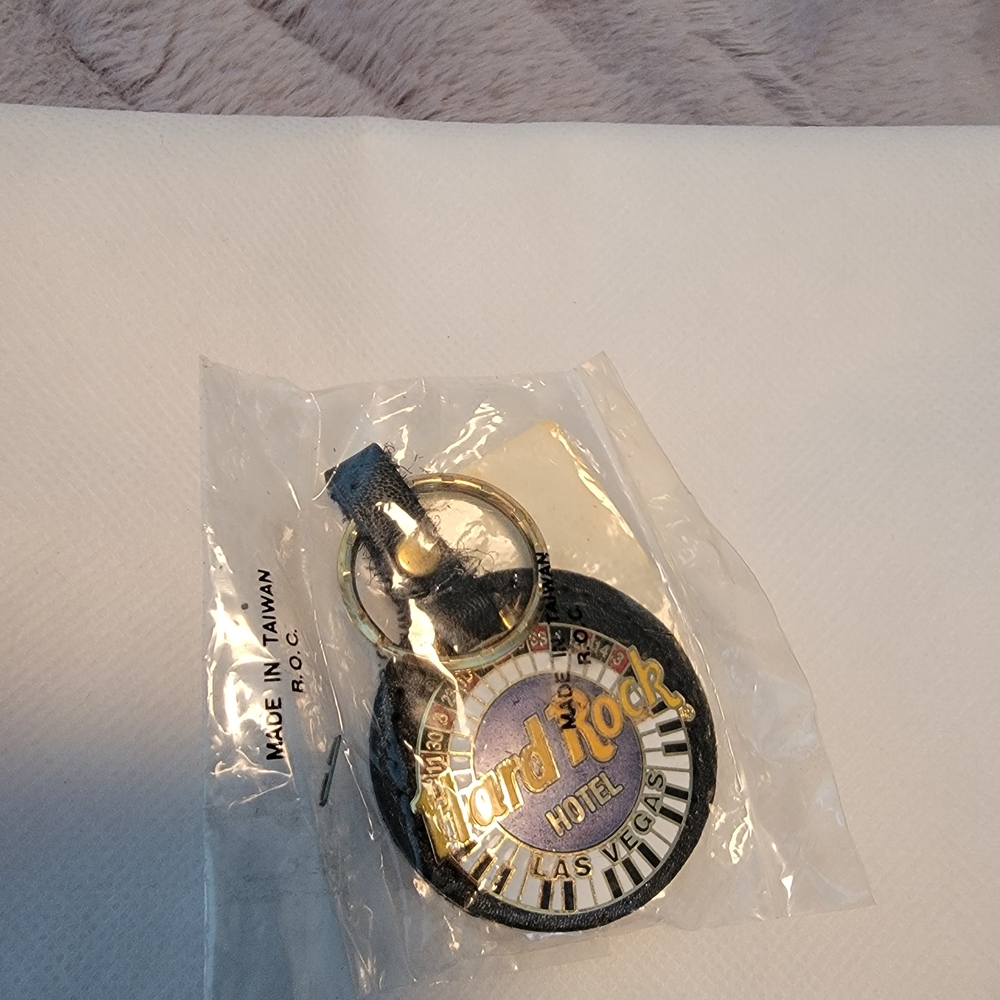 Hard Rock Cafe Black and Gold Keychain